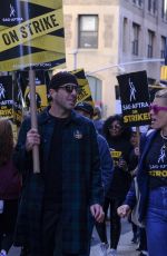 SARAH PAULSON and BUSY PHILIPPS at Sag-Aftra Picket Line at Netflix in New York 10/23/2023