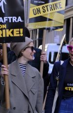 SARAH PAULSON and BUSY PHILIPPS at Sag-Aftra Picket Line at Netflix in New York 10/23/2023
