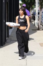XOCHITL GOMEZ Fits in a Pizza Break Outside Practice for Dancing with the Stars in Los Angeles 10/01/2023