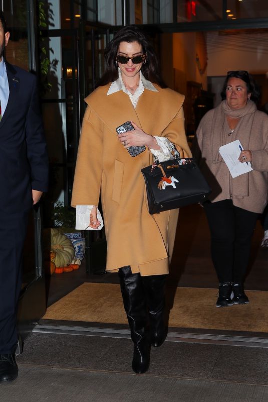ANNE HATHAWAY Leaves a Press Junket in New York 11/15/023