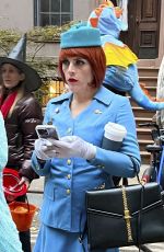BUSY PHILIPPS on Halloween in Stewardess Costume Out in New York 10/31/2023