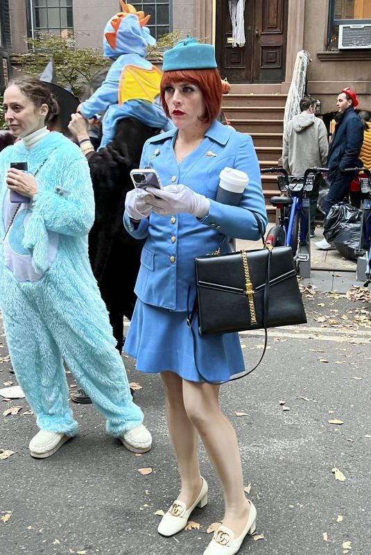 BUSY PHILIPPS on Halloween in Stewardess Costume Out in New York 10/31/2023