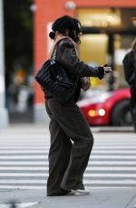 CHALRI XCX Out Smoking in New York 11/12/2023