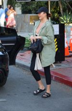 CHRISSY TEIGEN Shopping at Bottega Veneta in West Hollywood 11/10/2023