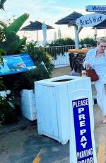 DAKOTA FANNING Out with Friends and Family on the Beach in Malibu 11/12/2023