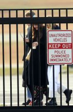 DAKOTA JOHNSON Getting on a Helicopter in Hamptons 11/26/2023