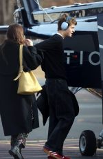 DAKOTA JOHNSON Getting on a Helicopter in Hamptons 11/26/2023