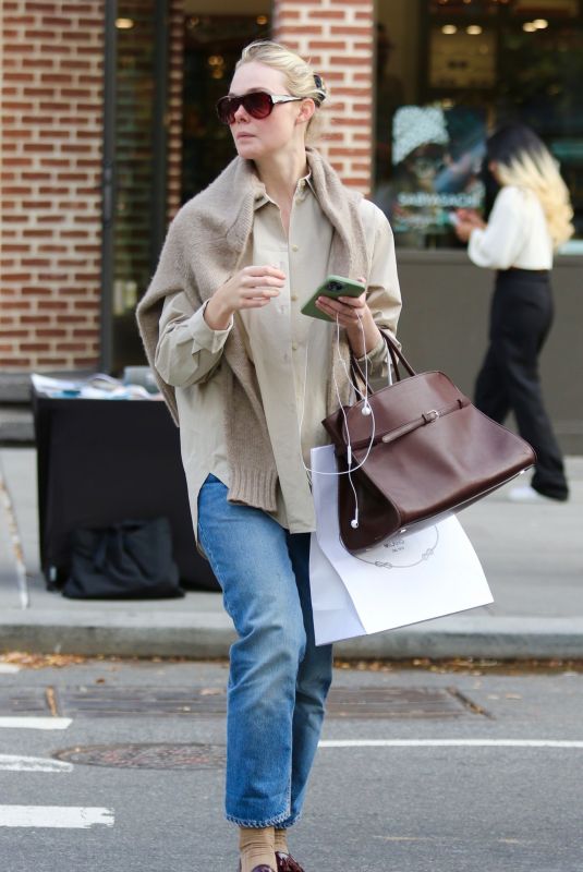 ELLE FANNING Out and About in New York 11/06/2023