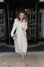 EMILIA CLARKE Leaves Harper