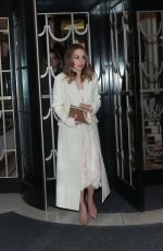 EMILIA CLARKE Leaves Harper