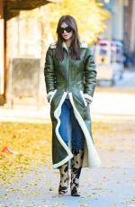 EMILY RATAJKOWSKI in a Green Winter Coat and Cow Printed Boots Out in Ney York 11/20/2023