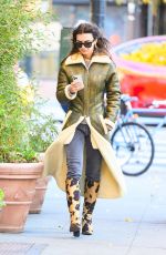 EMILY RATAJKOWSKI in a Green Winter Coat and Cow Printed Boots Out in Ney York 11/20/2023