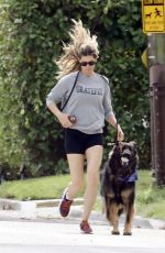 GISELE BUNDCHEN Heading to a Park with Her Dog in Miami 11/04/2023 