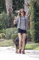 GISELE BUNDCHEN Heading to a Park with Her Dog in Miami 11/04/2023 