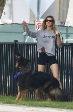 GISELE BUNDCHEN Heading to a Park with Her Dog in Miami 11/04/2023 