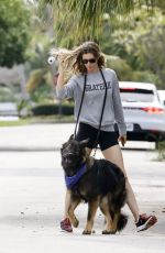 GISELE BUNDCHEN Heading to a Park with Her Dog in Miami 11/04/2023 