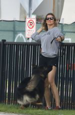 GISELE BUNDCHEN Heading to a Park with Her Dog in Miami 11/04/2023 