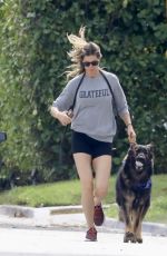 GISELE BUNDCHEN Heading to a Park with Her Dog in Miami 11/04/2023 