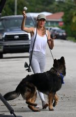 GISELE BUNDCHEN Out with Her German Shepherd in Surfside 11/02/2023
