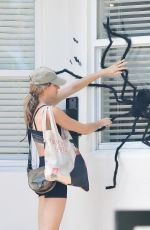 GISELE BUNDCHEN with a Giant Spider on Halloween in Miami 10/31/2023