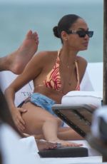 JOAN SMALLS in Bikini at a Beach in Miami 11/28/2023