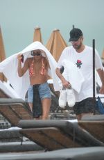 JOAN SMALLS in Bikini at a Beach in Miami 11/28/2023