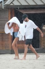 JOAN SMALLS in Bikini at a Beach in Miami 11/28/2023