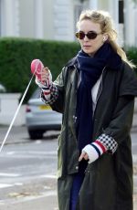 JODIE COMER Out Walking Her Dog in London 11/07/2023