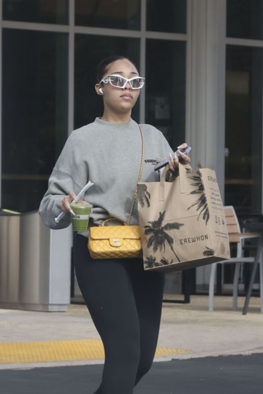 JORDYN WOODS Shopping at Erewhon Market in Calabasas 11/27/2023