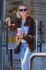 KIRSTEN DUNST Grabs a Coffee Before Making a Stop at a CBD Store 11/01/2023