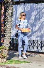 KIRSTEN DUNST Grabs a Coffee Before Making a Stop at a CBD Store 11/01/2023