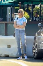 KIRSTEN DUNST Grabs a Coffee Before Making a Stop at a CBD Store 11/01/2023