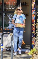 KIRSTEN DUNST Grabs a Coffee Before Making a Stop at a CBD Store 11/01/2023