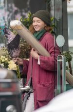 LILY COLE Out Shopping in Notting Hill 11/22/2023