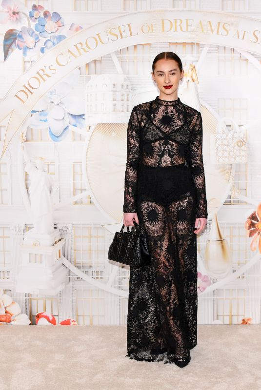 LOLA TUNG at Dior’s Carousel of Dreams at Saks in New York 11/20/2023