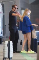 MARGOT ROBBIE and Tom Ackerley Arrives at Airport in Auckland 11/12/2023