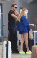 MARGOT ROBBIE and Tom Ackerley Arrives at Airport in Auckland 11/12/2023