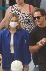 MARGOT ROBBIE and Tom Ackerley Arrives at Airport in Auckland 11/12/2023