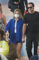 MARGOT ROBBIE and Tom Ackerley Arrives at Airport in Auckland 11/12/2023