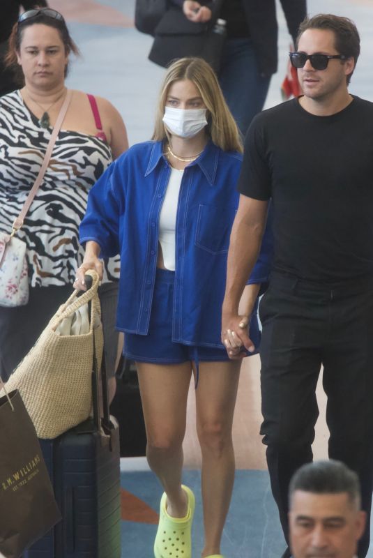 MARGOT ROBBIE and Tom Ackerley Arrives at Airport in Auckland 11/12/2023