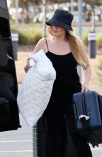 MARGOT ROBBIE and Tom Ackerley at Airport in Brisbane 11/05/2023