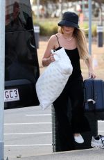 MARGOT ROBBIE and Tom Ackerley at Airport in Brisbane 11/05/2023