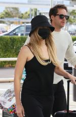 MARGOT ROBBIE and Tom Ackerley at Airport in Brisbane 11/05/2023
