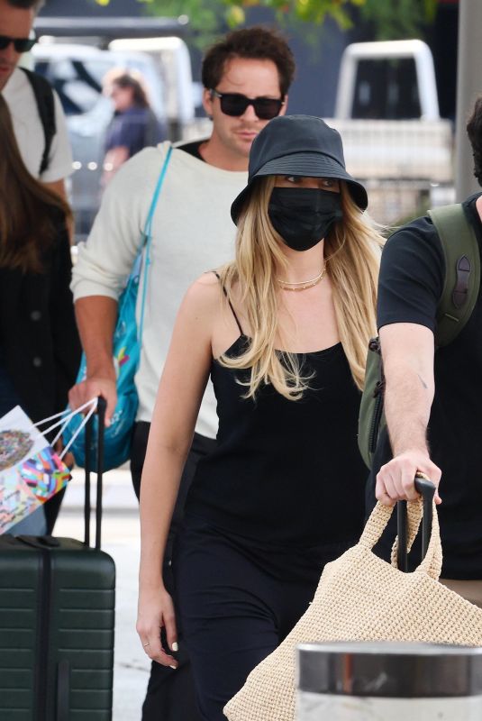 MARGOT ROBBIE and Tom Ackerley at Airport in Brisbane 11/05/2023