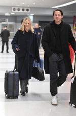 MARGOT ROBBIE and Tom Ackerley at JFK Airport in New York 11/26/2023