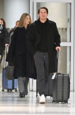 MARGOT ROBBIE and Tom Ackerley at JFK Airport in New York 11/26/2023