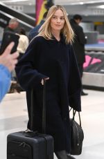 MARGOT ROBBIE Arrives at Airport in New York 11/26/2023
