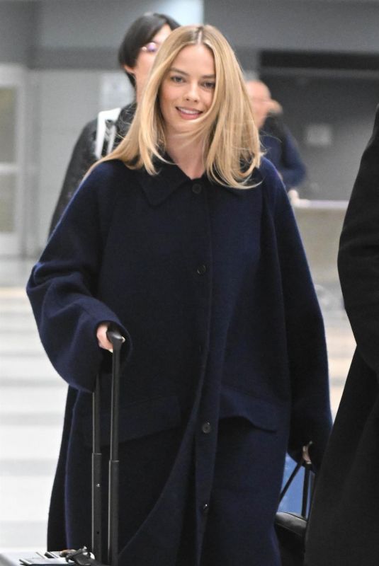 MARGOT ROBBIE Arrives at Airport in New York 11/26/2023
