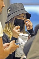 MARGOT ROBBIE at Airport in Melbourne 11/07/2023