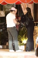 NICOLA PELTZ and Brooklyn Beckham Leavies The Bird Streets Club in West Hollywood 11/21/2023